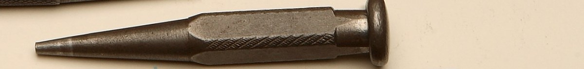 Punzón corrector de braille